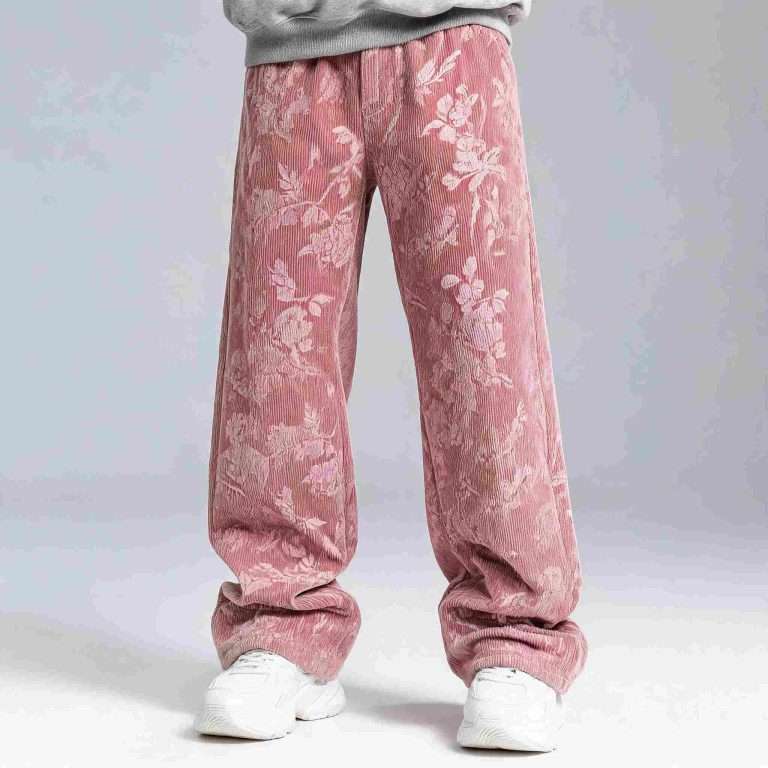 Custom printed corduroy pants manufacturer China - front view with floral pattern and 8-wale ribbed texture